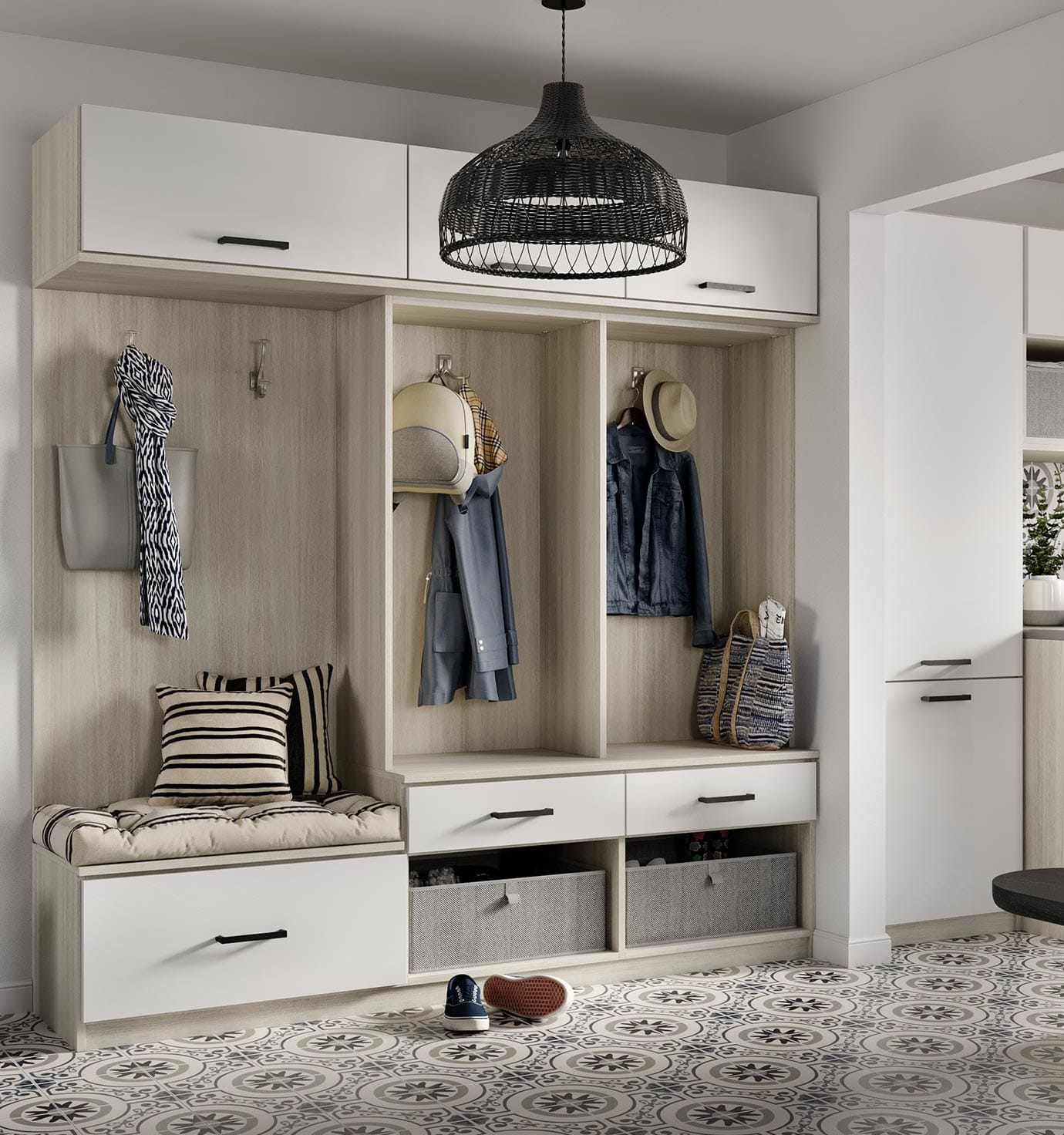 Mudroom custom storage solutions with hooks for hanging space by California Closets